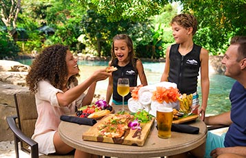 Family dining during a visit to Discovery Cove